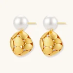 Gold-plated sterling silver drop earrings with white freshwater pearl studs and overlapping petal design with crystal accents