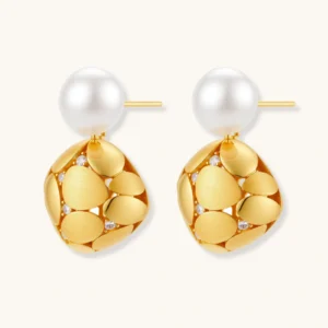 Gold-plated sterling silver drop earrings with white freshwater pearl studs and overlapping petal design with crystal accents