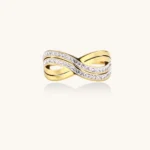 Gold-plated ring with interweaving wave bands and two rows of clear rhinestones creating an infinity pattern