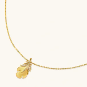 18K gold-plated 925 silver leaf pendant with brushed finish and cubic zirconia accents on a beaded ball chain.