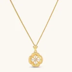 Gold-plated flower pendant necklace with brushed finish, open-work center, marquise CZ stones on wheat chain, S925 stamp.