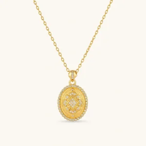 Oval gold coin pendant with pave CZ mandala motif and beaded border on an 18K gold-plated cable chain.