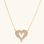18K gold-plated 925 silver open heart pendant necklace with scattered cubic zirconia stones on a fine cable chain.