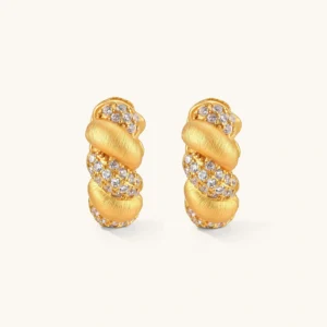 Pair of 18K gold-plated 925 silver huggie hoops with twisted braid texture and pavé cubic zirconia detailing, 15mm.
