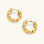Pair of 18K gold-plated 925 silver huggie hoops with twisted braid texture and pavé cubic zirconia detailing, 15mm.