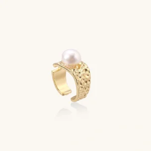 Wide gold-plated ring with organic textured band and white freshwater pearl centerpiece